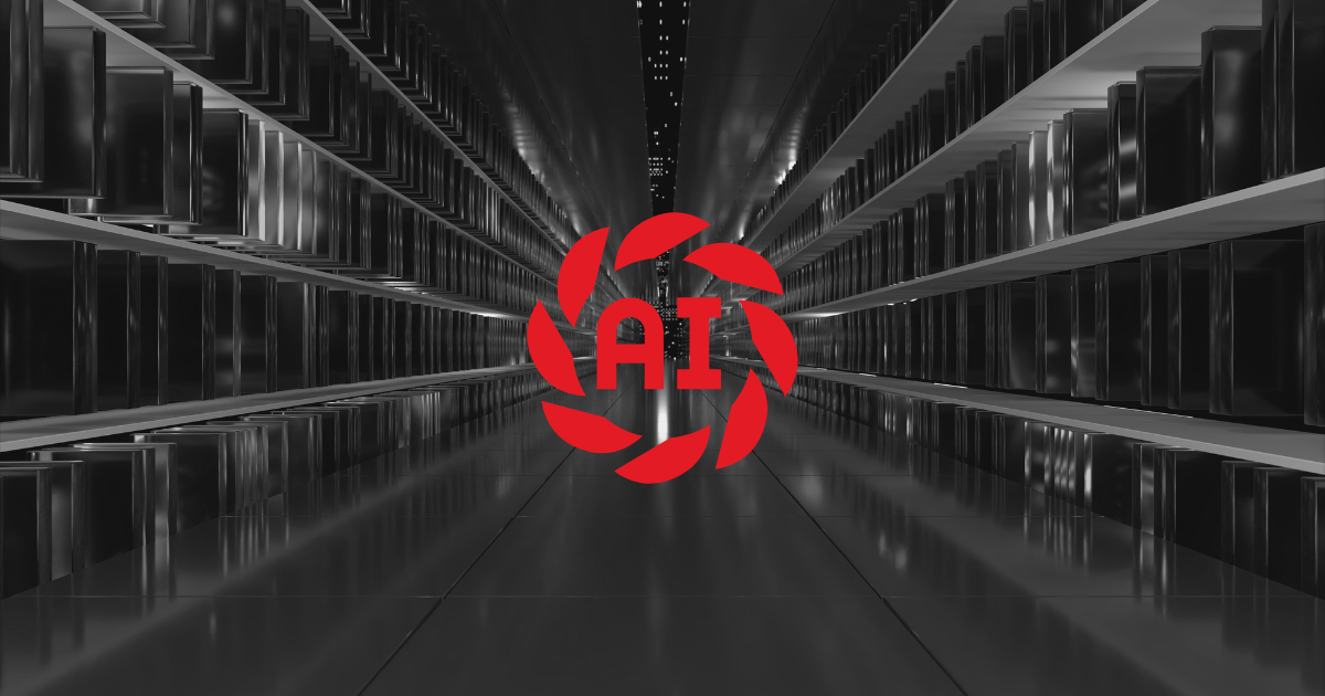 A red and black logo displayed in a dimly lit room, representing AI and ChatGPT technology.